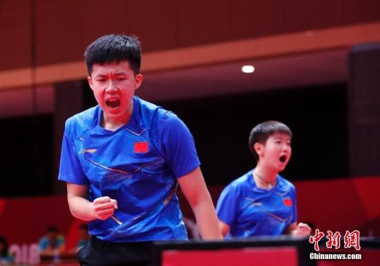 資料圖：雅加達(dá)亞運(yùn)會(huì)，王楚欽/孫穎莎奪得混雙冠軍。 <a target='_blank' href='/'>中新社</a>記者 劉關(guān)關(guān) 攝