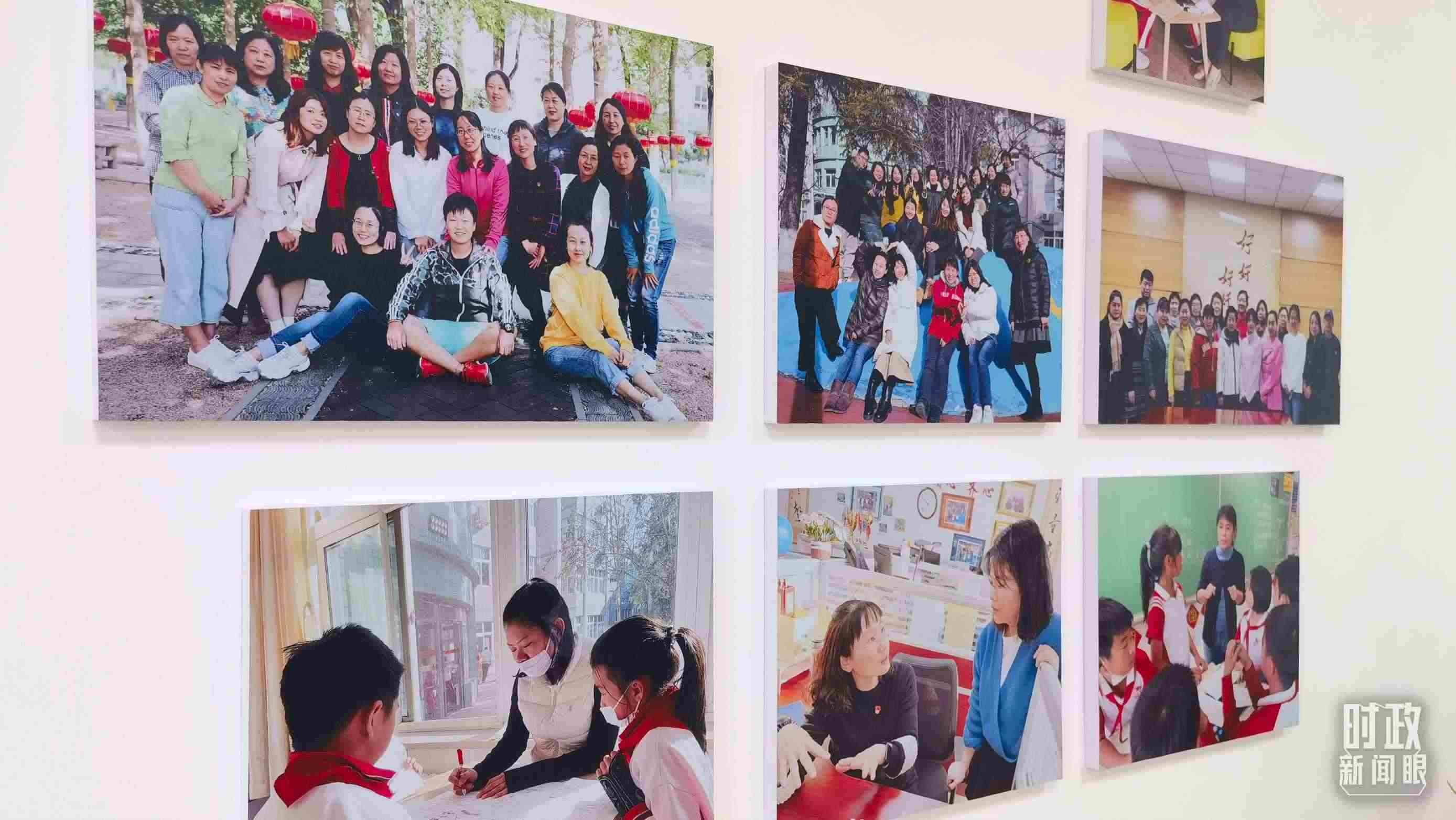 △五年級教師辦公室內(nèi)的合影展板。（總臺央視記者賈林拍攝）