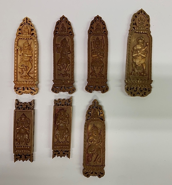 木雕牌飾（暫定名）。國(guó)家文物局供圖