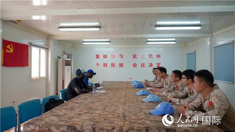 圖1 檢查組聽取工作匯報。王軍杰攝